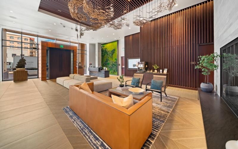 Settle into comfort at Dryden a large living room with a large glass wall