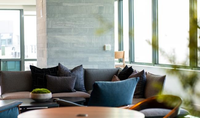 a living room with a couch and a table